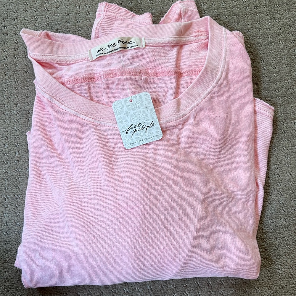 A pink womens sweatshirt